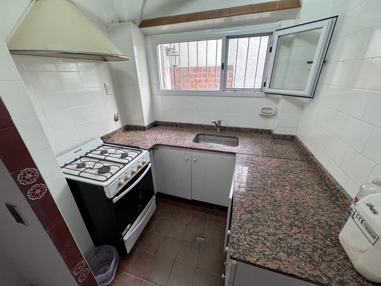 Local comercial con departamento al fondo